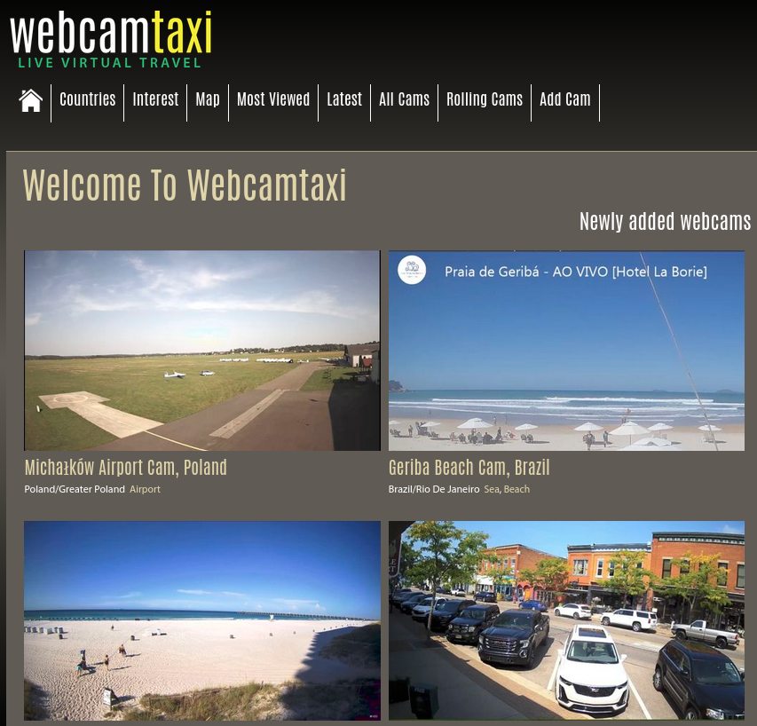 A screenshot of the WebcamTaxi website homepage displaying live webcam feeds from various locations around the world. The screen shows four different webcam views: Michałków Airport in Poland, Geribá Beach in Brazil, a sandy beach with blue skies, and a busy street with parked cars in a city setting.